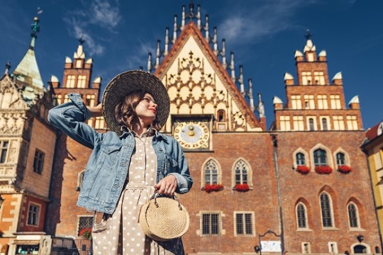 A woman standing in Wroclaw