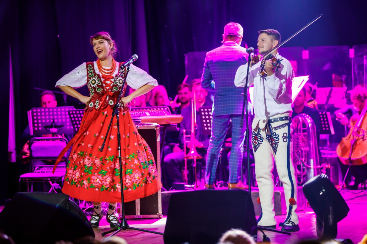 singers in traditional costumes on stage