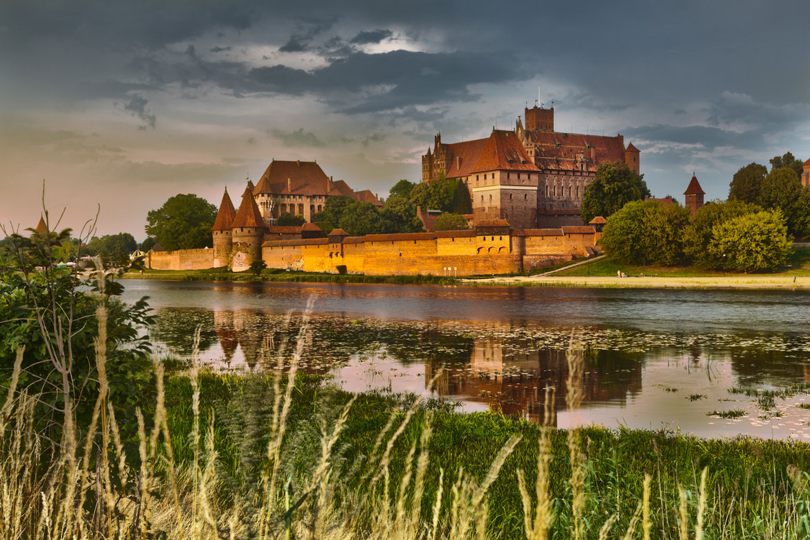 a floating river with a castle in the background